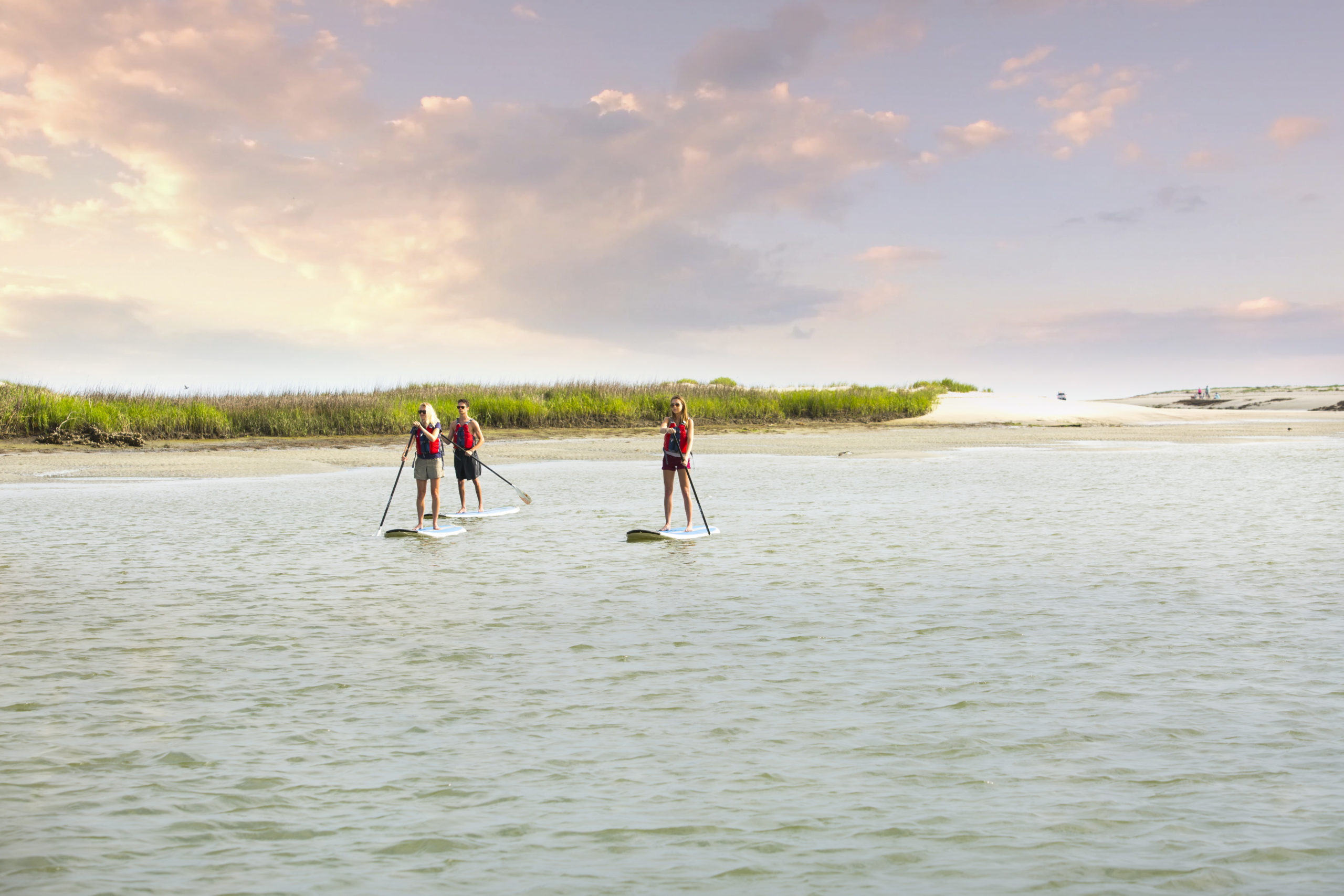 paddle boarders on the kiawah river