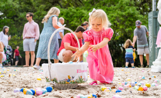 Little girl on egg hunt at Easter