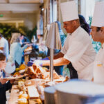 The chef servers up delicious meal.
