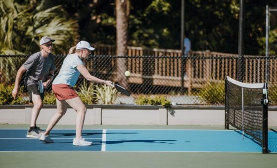 Couple playing Pickleball Roy Barth Tennis Center